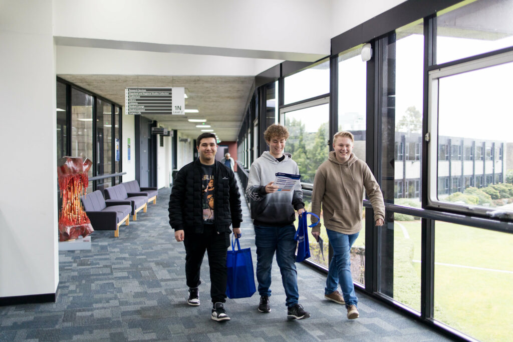 young men walking the corridors of Federation University Gippsland